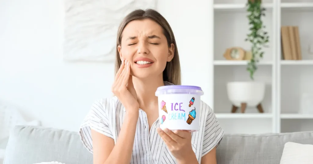 Woman With Tooth Pain After Eating Ice Cream