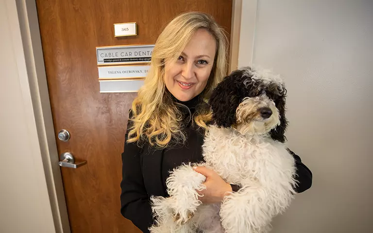 Dr. Ostrovsky with the Therapy Dog